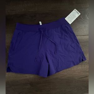 License to Train High Rise Shorts 4 in